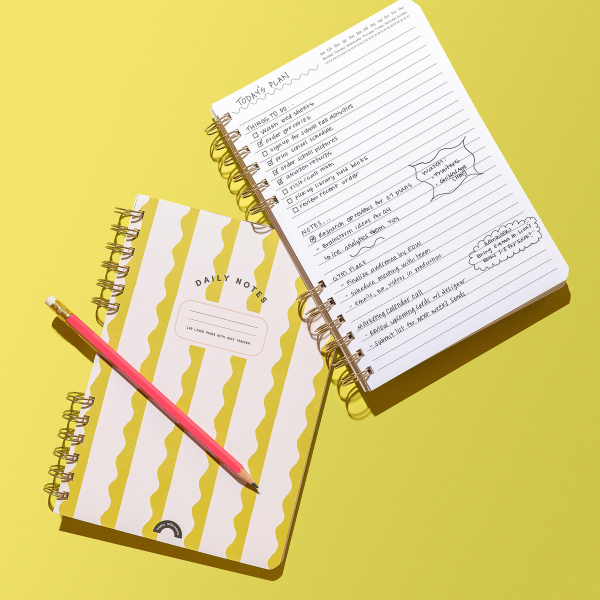 Lima Wavy Stripes Daily Notes notebook beside open lined pages with a handwritten daily plan and pink pencil on a yellow background.