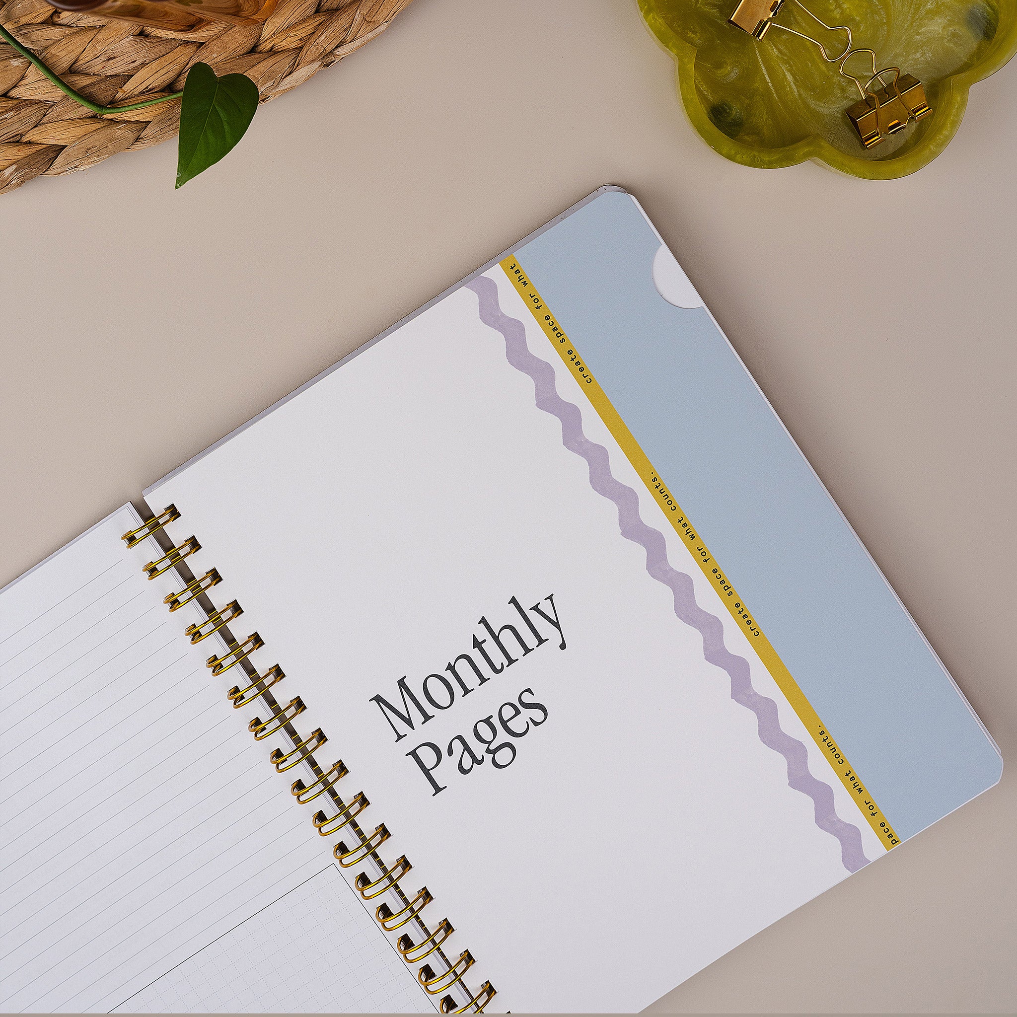 Quarterly Plans monthly divider and monthly calendar spread inside the 90-Day Planner.