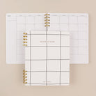 Minimalist black and white quarterly planner cover with monthly calendar by Friday Afternoons Co