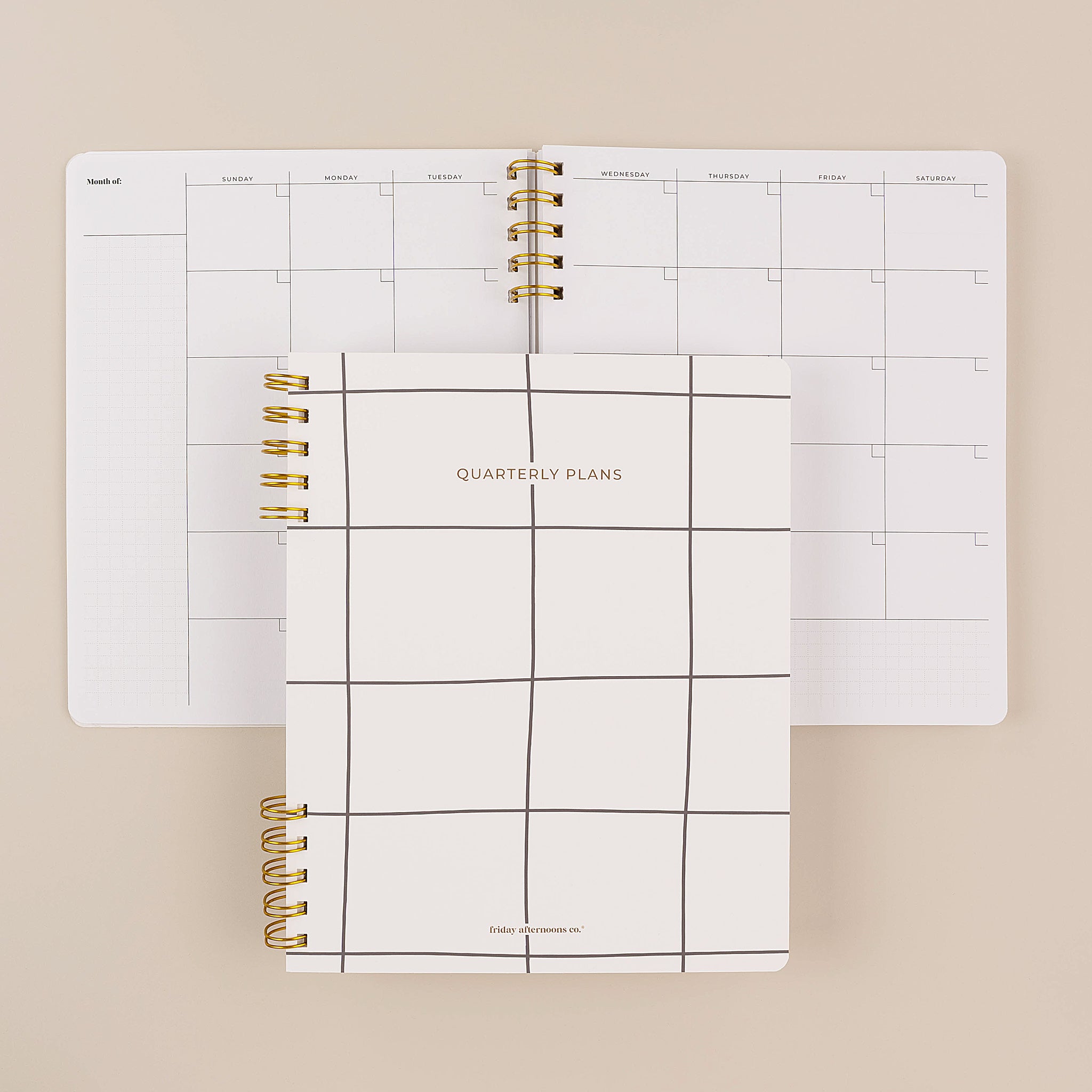 Minimalist black and white quarterly planner cover with monthly calendar by Friday Afternoons Co