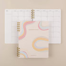 Swirly lines quarterly planner cover with monthly calendar by Friday Afternoons Co