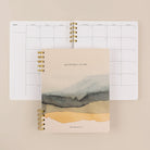 Watercolor landscape quarterly planner cover with monthly calendar by Friday Afternoons Co