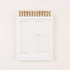 Undated daily planner open to task and schedule layout