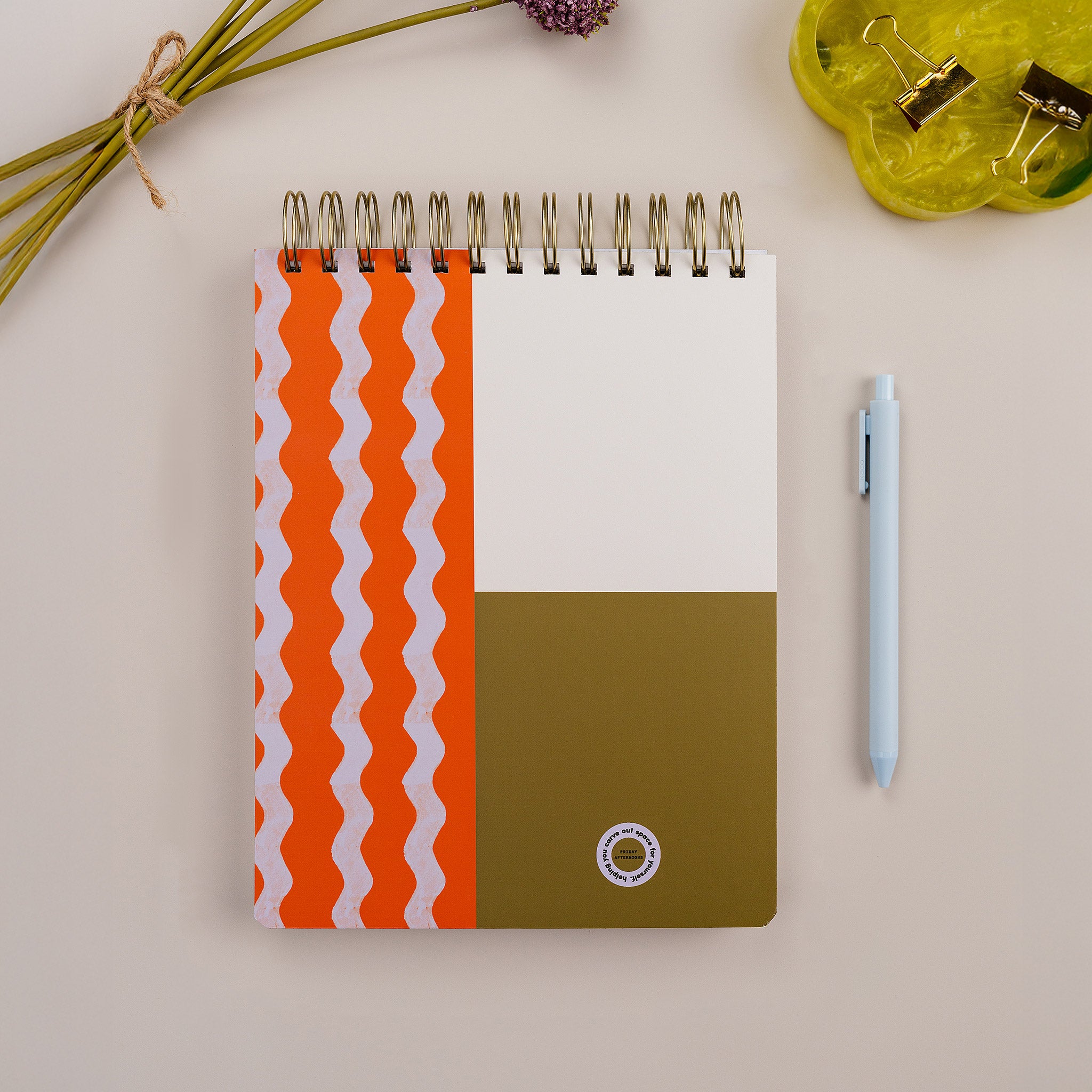 Tulip Wave Workday Planner styled with pen and office accessories on neutral desk surface.