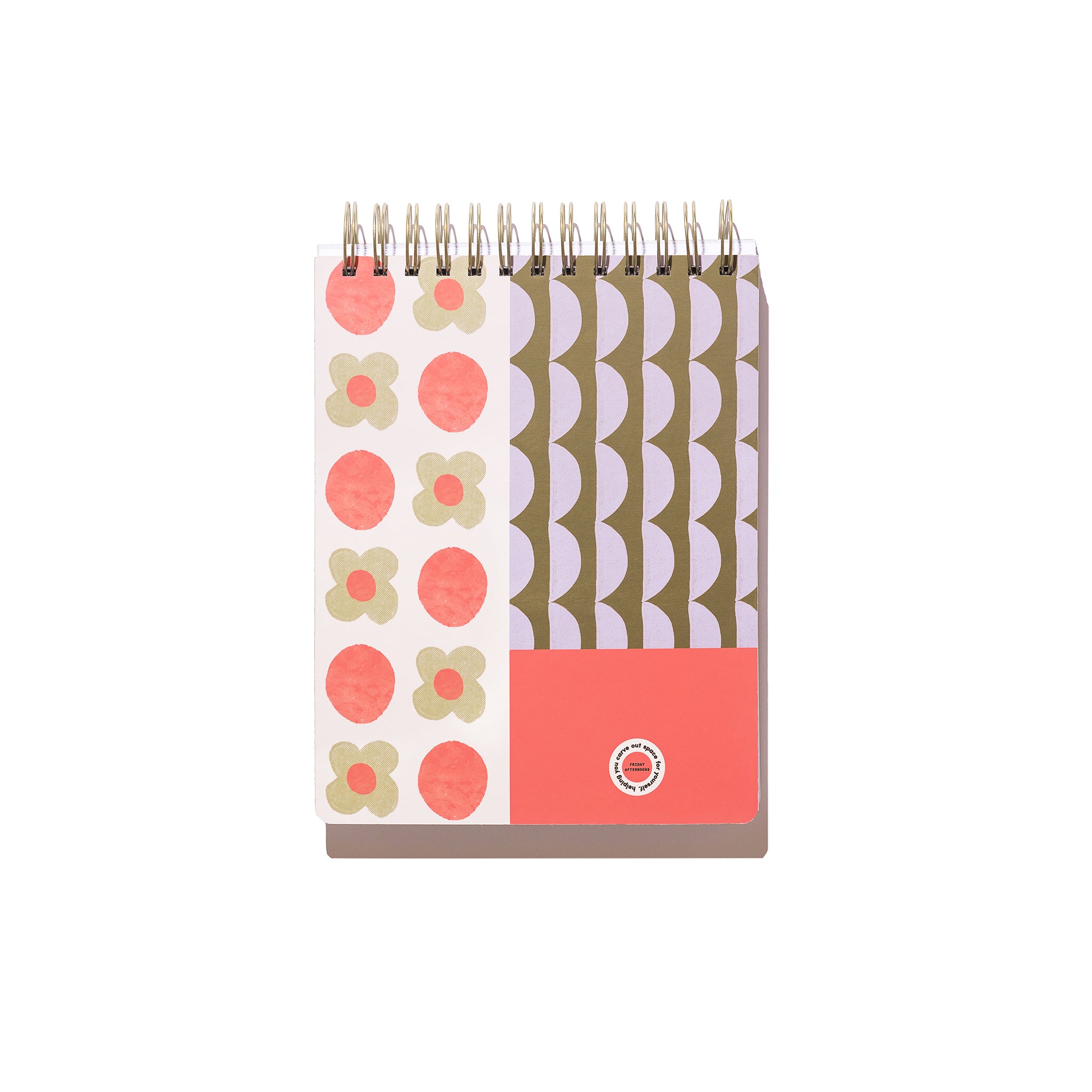 Back cover of the Lavender Scallop Workday Planner with lavender scallop stripes, coral dots and flower pattern, coral color block, and gold top-spiral binding.