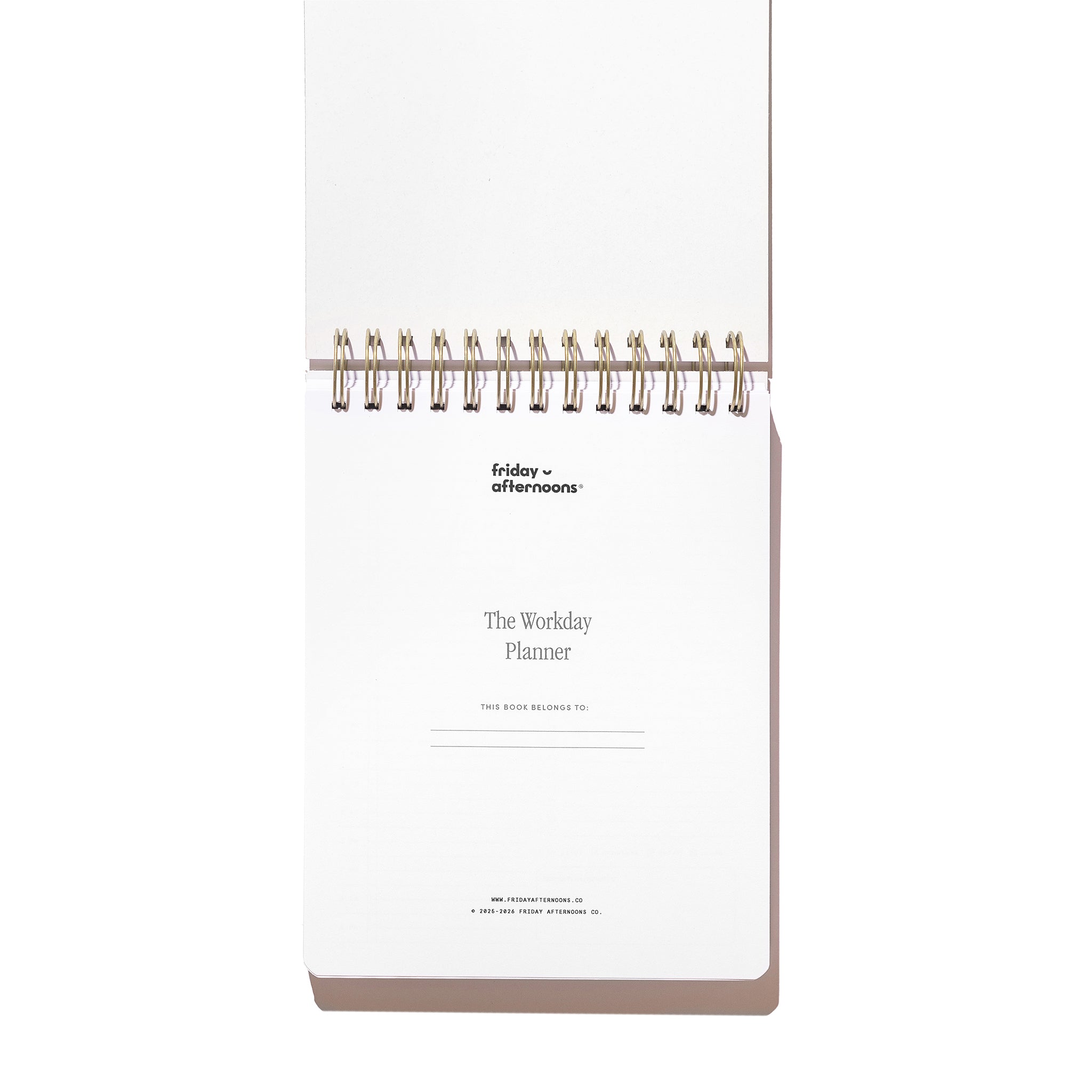 Interior title page of the Workday Planner with top-spiral binding and space to write the owner’s name.