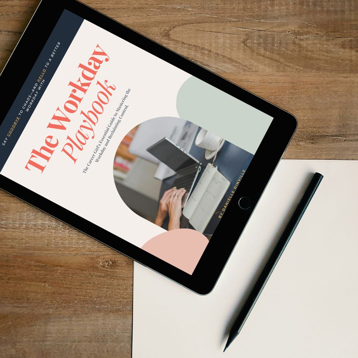 ipad with workday playbook cover on desk with pen and paper