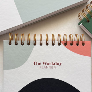 Flat lay of best planner for work workday planner