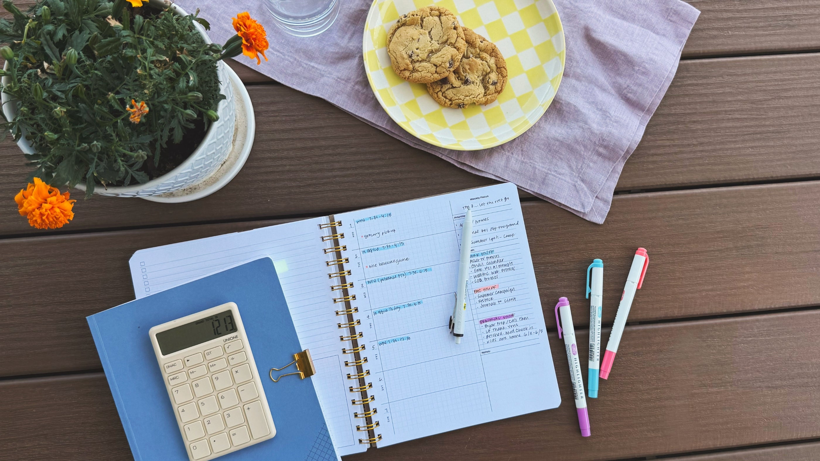 friday afternoons co planner with plant and plate of cookies