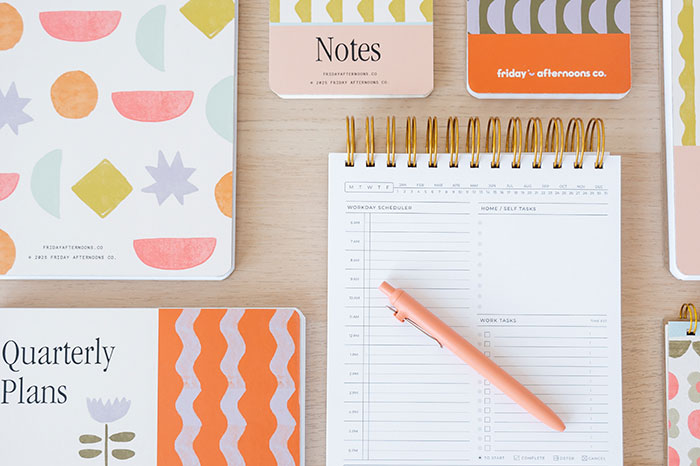 cozy desk scene with simple planner and natural light — Friday Afternoons origin story