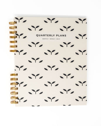 minimal geometric botanical quarterly planner flat lay