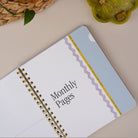 Quarterly Plans monthly divider and monthly calendar spread inside the 90-Day Planner.