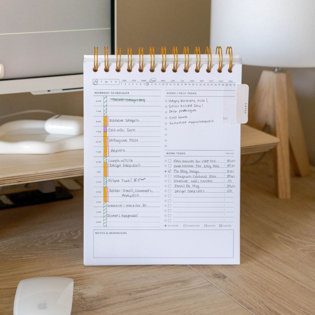 simple planner on desk standing top spiral daily planner on desktop