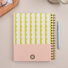 Lima Wavy Stripes Quarterly Planner styled with pen and office accessories on neutral desk surface.