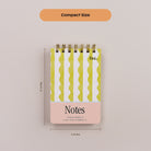 Mini Memo Notebook in Lima Wavy Stripes cover displayed upright, labeled as compact size.