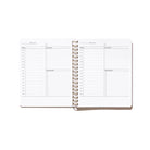 Quarterly Plans daily planning pages with hourly schedule, daily focus, work checklist, and personal checklist sections.