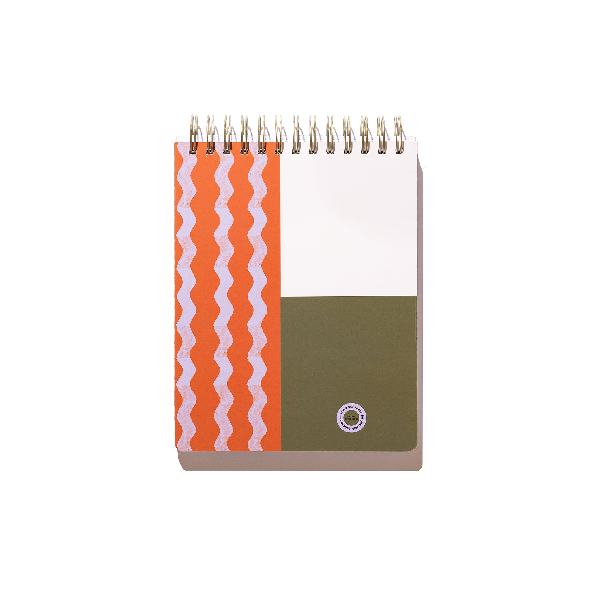 Back cover of the Tulip Wave Workday Planner with orange wavy stripes, olive color block, and gold top-spiral binding.